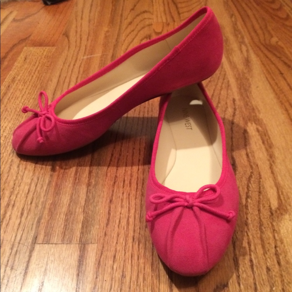 Bright pink flats.